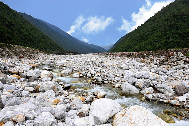 Stone and the river stock photo