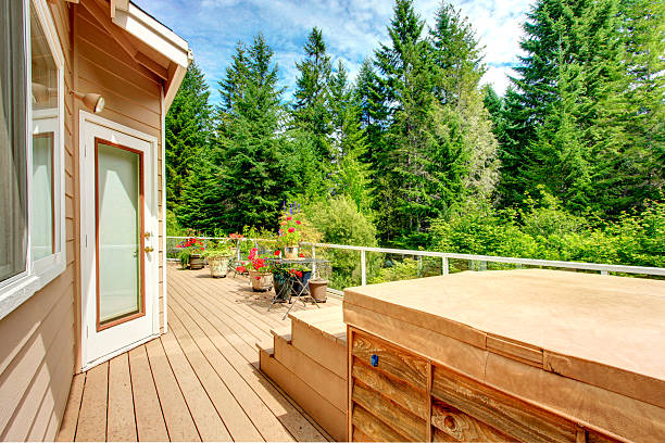 istock Countryside house. Walkout deck with hot tub 509657087