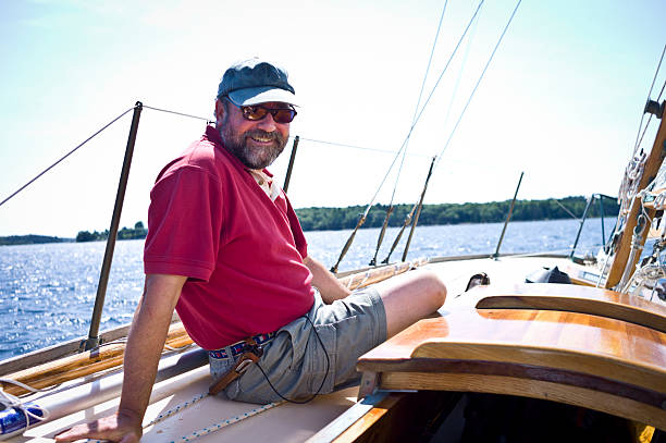 istock Mature Man Aboard a Sailboat. 509657431