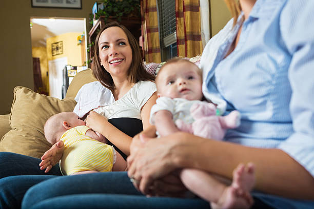 istock Mother with breastfed baby during breastfeeding support group meeting 509657477
