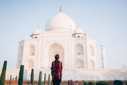 Woman looking at Taj Mahal 