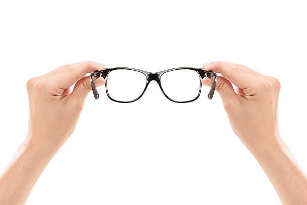istock Male hands holding a pair of glasses 509659169