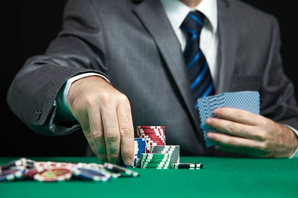 istock Blackjack In A Casino, A Man Makes A Bet 509660549