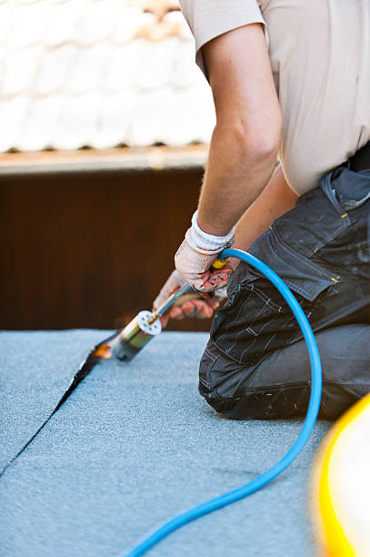 istock Flat roof covering works with roofing felt 509660951
