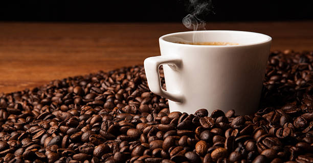 istock cup of black coffee with roasted coffe beans 509661885