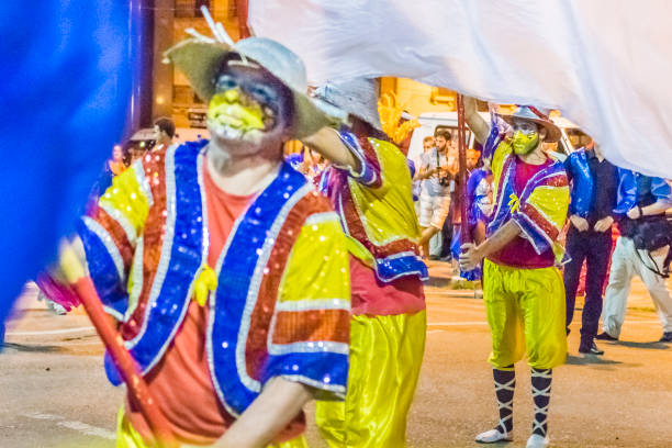 istock Costume Men with Flag Marching at Carnival Parade of Uruguay 509662626
