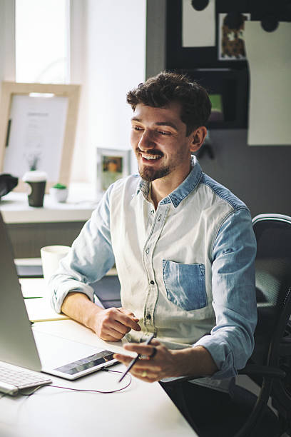 istock Handsome businessman working in office 509669858