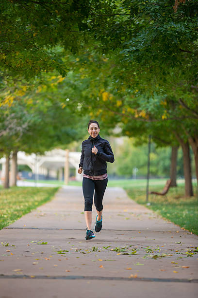 istock Young adult female exercising 509670490