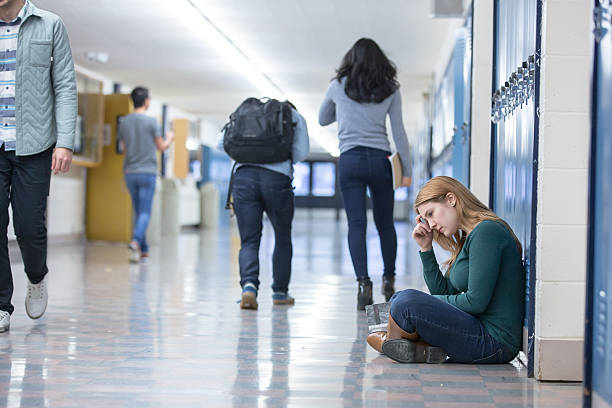 istock Student getting bullied in school hallway 509671250