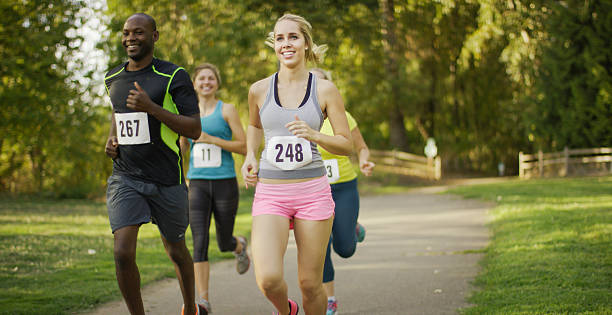 istock Group of runners running outdoors in a race 509671368