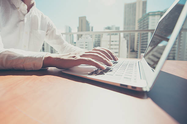 istock Businessman are using a laptop at the window 509673146