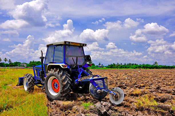 istock Agriculture plowing tractor on wheat cereal fields moving ,farmer job 509674822