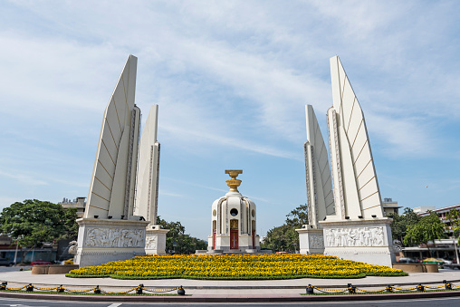 The Democracy Monument, Bangkok, Thailand. The monument was designed by Maeo Aphaiyawon and it was commissioned in 1939. 