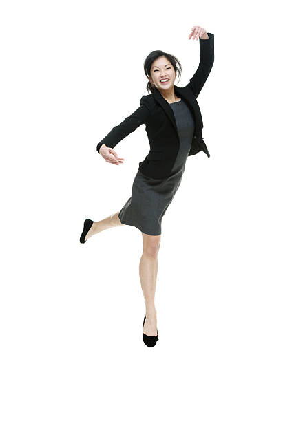 istock Smiling businesswoman dancing 509677854