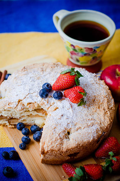 Apple pie with strawberries and blueberries