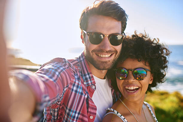 istock Young beautiful couple on roadtrip making selfie 509682246