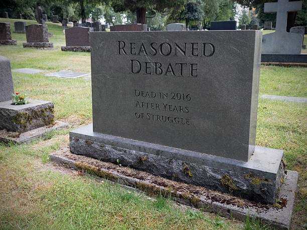 Gravestone Marking the Death of Reasoned Debate stock photo