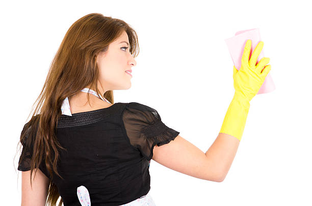 istock Pretty young brunette girl cleaning 509684427
