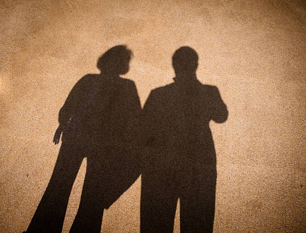 Shadow of couple on the road.shadow of two people