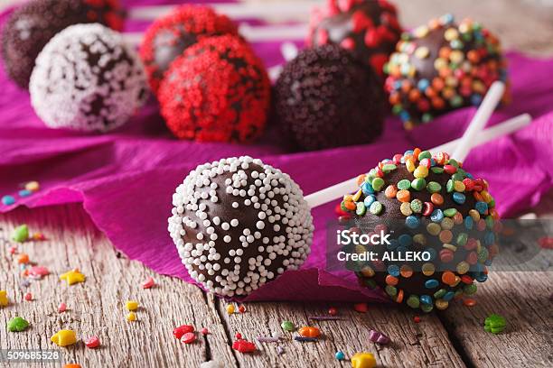 Festive Chocolate Cake Pops With Candy Sprinkles Closeup Horiz Stock Photo - Download Image Now