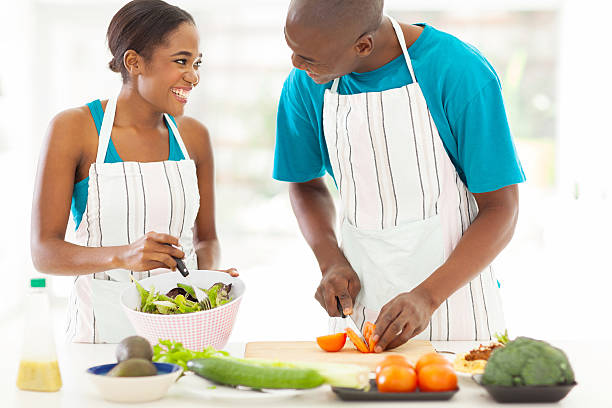 istock african husband and wife cooking dinner together 509685603