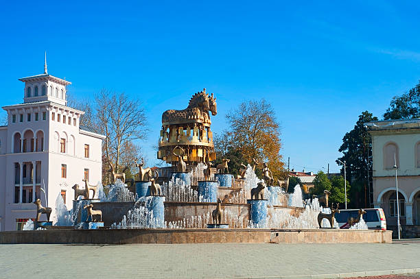 Fountain on central square in Kutaisi, Georgia,capital of antique Colhis. Fountain shows 30 golden statues of the Colchis