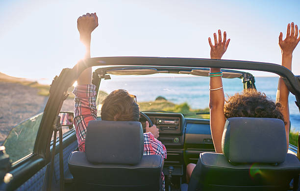 istock Young couple sitting in their car during roadtrip 509686830