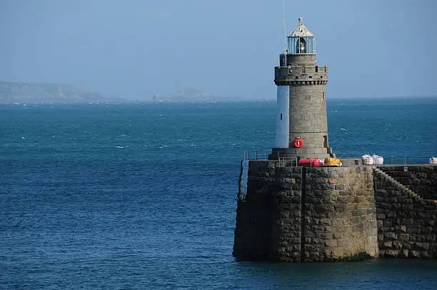 Telephoto image of the lighthouse at the harbour entrance near Castle Cornet.