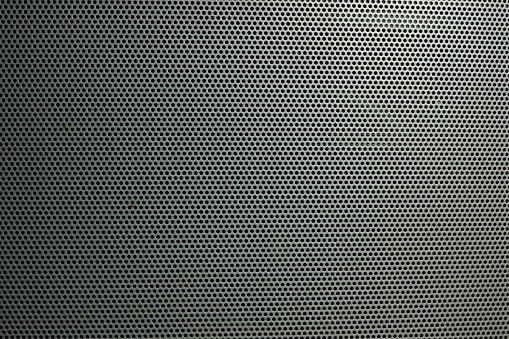 Technology background with seamless circle perforated carbon speaker grill texture for internet sites, web user interfaces (ui) and applications (apps)