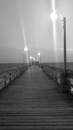 Picture of the pier at Holden Beach, North Carolina in the evening.