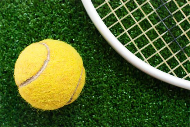 istock tennis ball on court 509702979