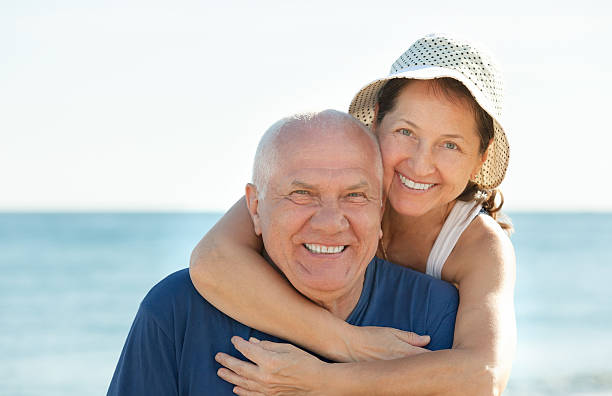 istock Mature couple at sea beach 509703111