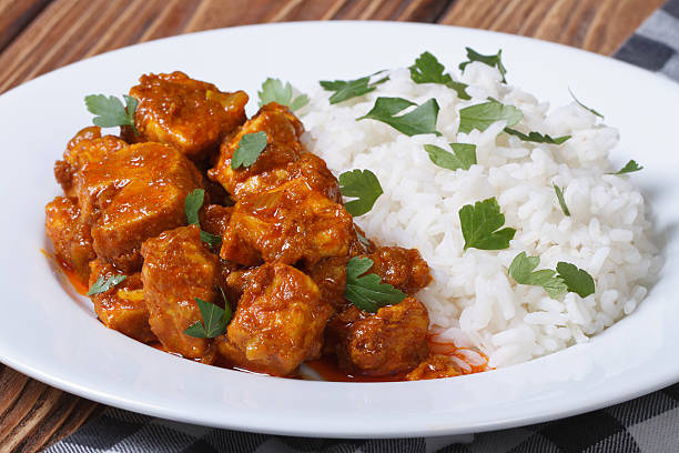 istock tasty fillet chicken curry with rice on a plate 509703609