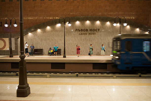 Sofia, Bulgaria - August 26, 2013: Commuters wait as a train pulls into Lavov most metro station in Sofia, Bulgaria. The station was put into operation on August 31, 2012.