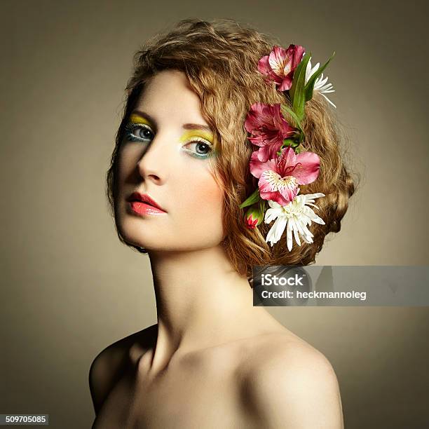 Beautiful Young Woman With Delicate Flowers In Their Hair Stock Photo - Download Image Now