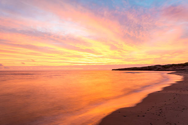 Beach at the crack of dawn stock photo