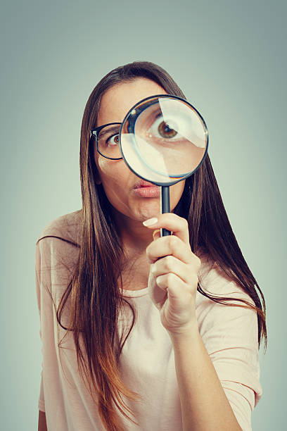 istock Geek with a magnifying glass 509712660