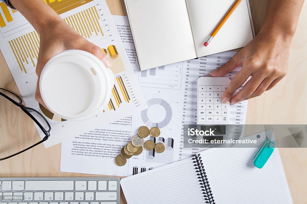 Businesswoman Working At Office Overhead View Of Businesswoman Working At Office Home Finances Stock Photo