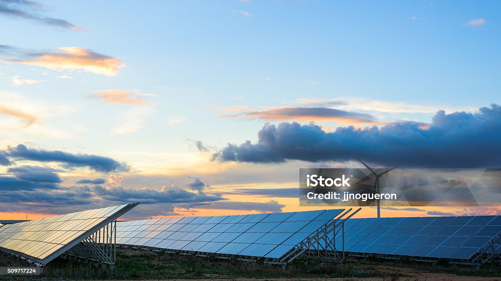 Renewable energies at sunset II Renewable energies at sunset Change Stock Photo