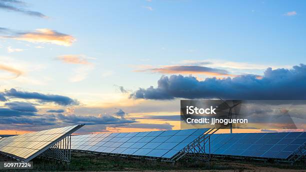 Renewable Energies At Sunset Ii Stock Photo - Download Image Now - Change, Fuel and Power Generation, Climate