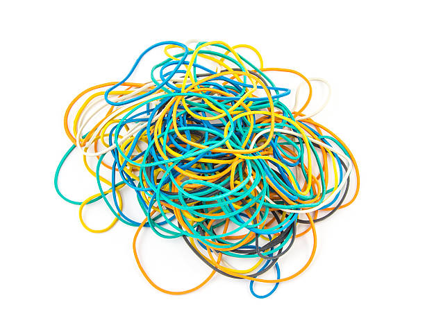 istock Group of multicolor rubber money bands isolated on white 509717424