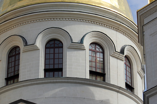 Arch window and architectural elements of the building.