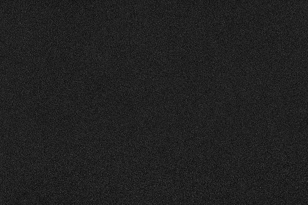 istock Dark black background with shiny speckles 509720074