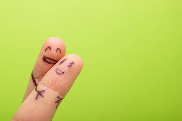 istock Funny finger holding blank bunner and smiling 509720416