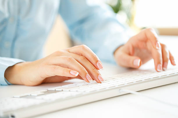 istock Woman office worker typing on the keyboard 509720850