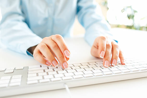 istock Woman office worker typing on the keyboard 509721006