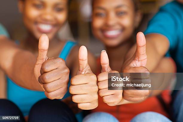 Group Of African Friends Thumbs Up Stock Photo - Download Image Now - Adult, Adult Student, African Ethnicity