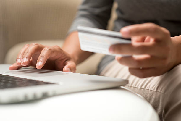 istock Close up of hands shopping online 509722211