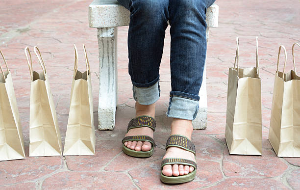 istock woman with shopping bags 509722603