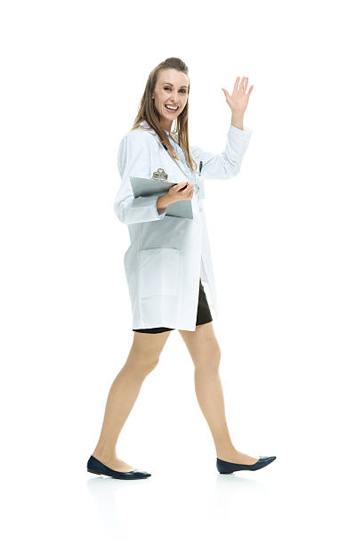 istock Happy doctor waving hand 509722920